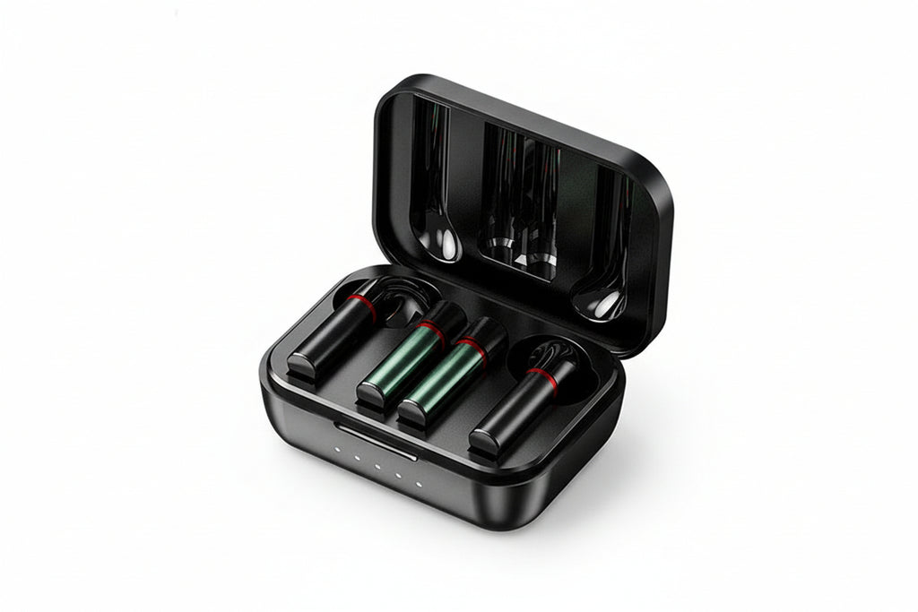 Black electronic device with batteries and charging cable on a white background